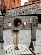 Stephanie in the stocks at Trakai (Alyssa Hasbrouck)